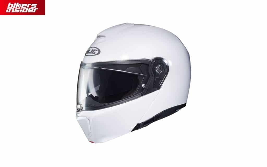 The shell of the HJC RPHA 90 is made of fiberglass composite material, which makes it very light and durable. Under the chin vent, you can see the chin bar toggle.