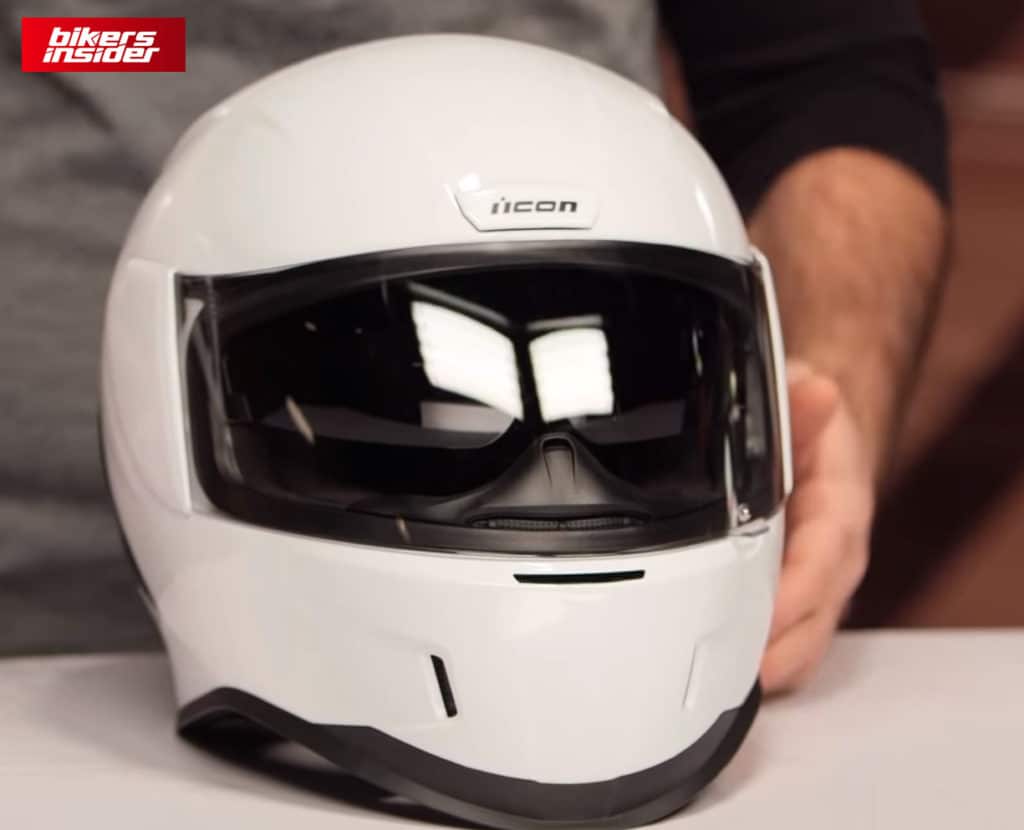 The front of the white Icon Airform helmet