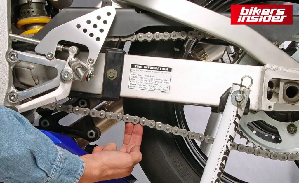 Adjusting motorcycle chain